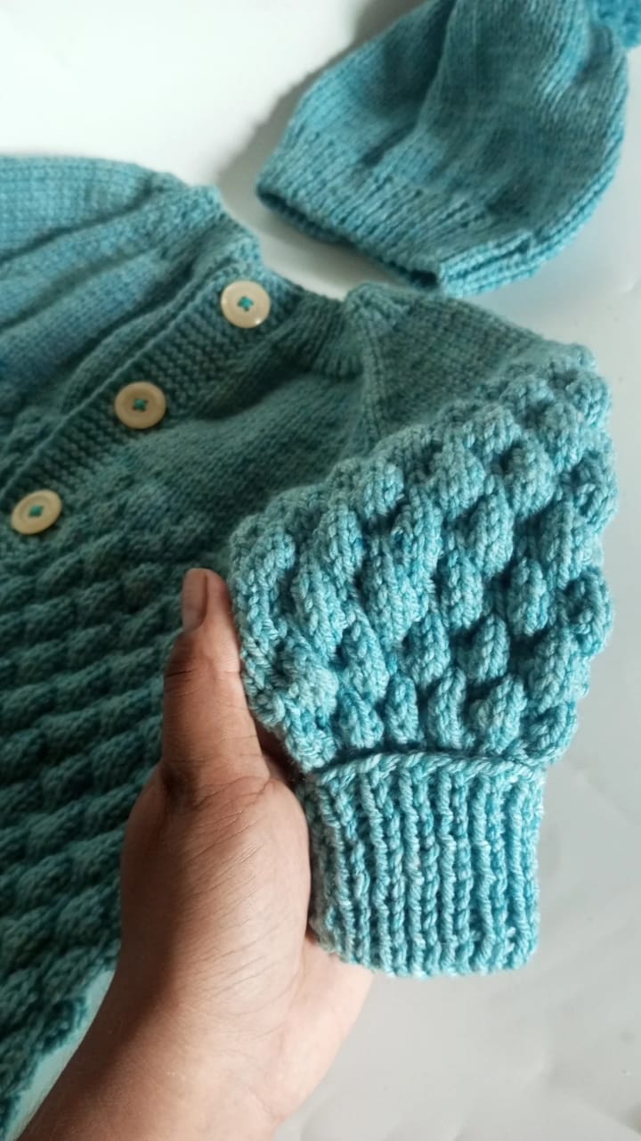 Bubble romper set in soft turquoise.